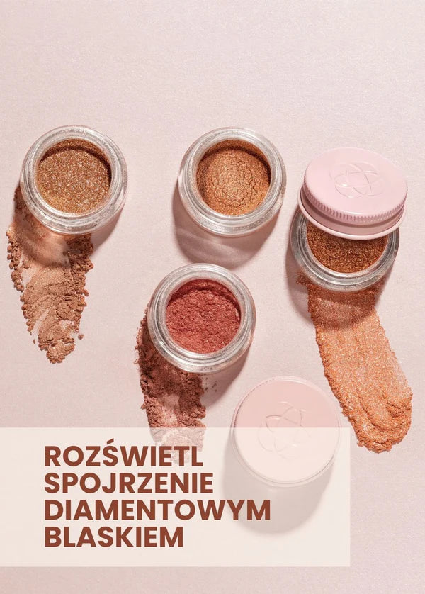Przezroczyste słoiczki z pigmentami mineralnymi Annabelle Minerals, oferujące rozświetlone spojrzenie