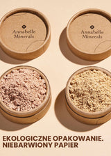 Pojemniki mineralnych podkładów Annabelle Minerals w różnych odcieniach, w papierowych opakowaniach z niebarwionego papieru