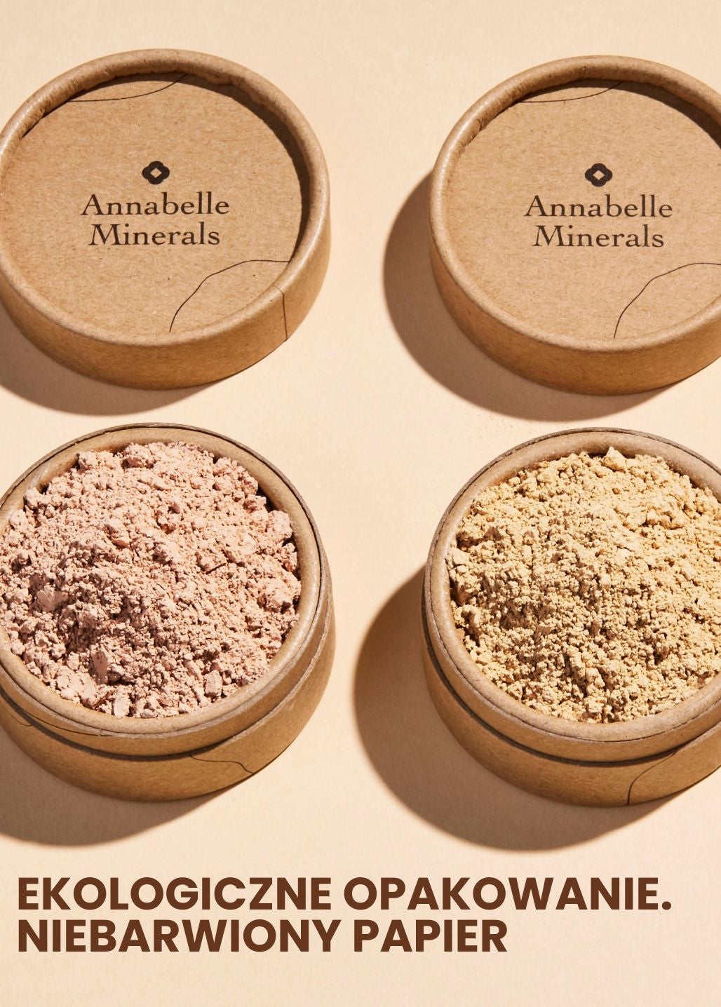 Pojemniki mineralnych podkładów Annabelle Minerals w różnych odcieniach, w papierowych opakowaniach z niebarwionego papieru