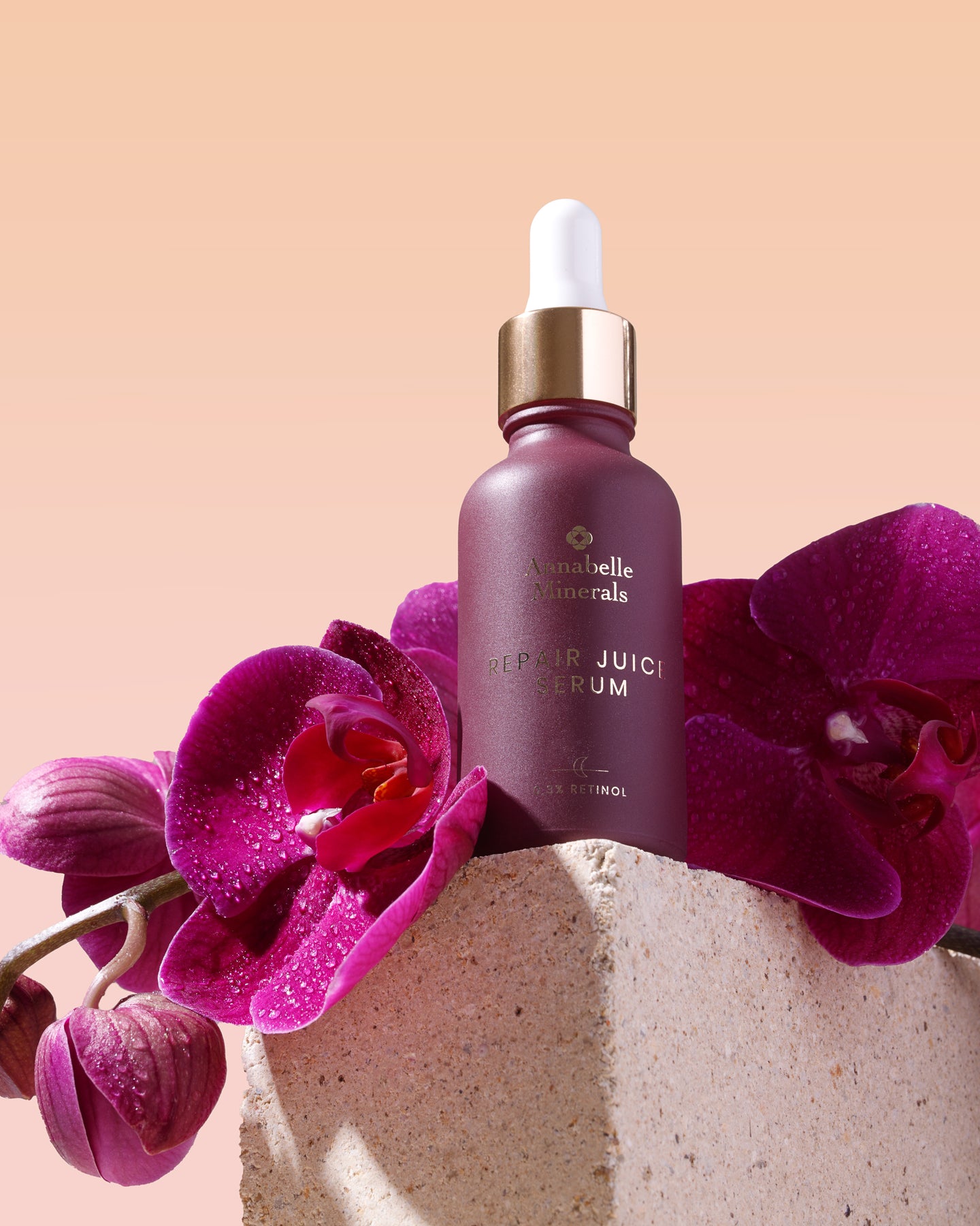 Serum Repair Juice Annabelle Minerals w aranżacji z orchideami