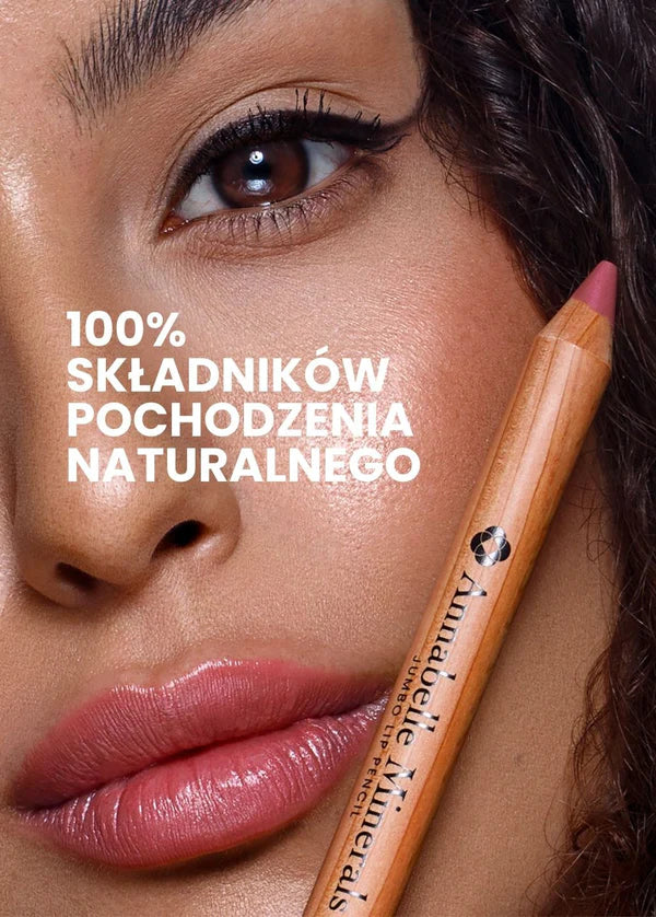 Makijaż w odcieniach naturalnych, usta podkreślone kredką do ust jumbo Annabelle Minerals, oczy wyraziste na tle hasła reklamowego